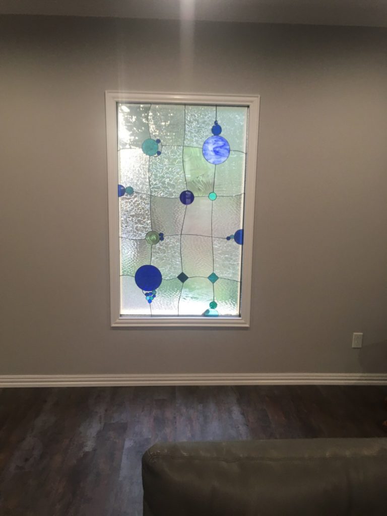 Triple paned stained glass bubbles design