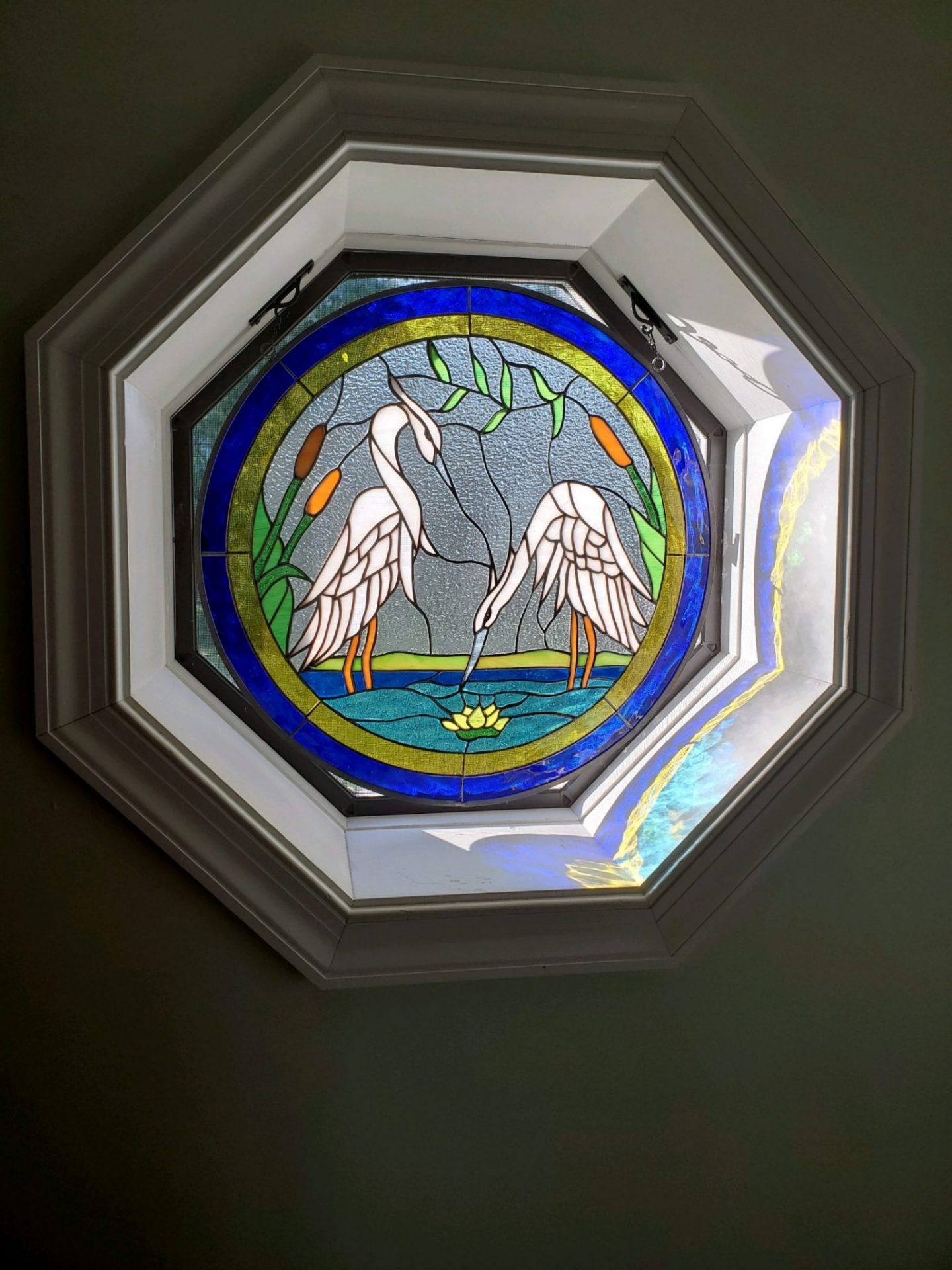 round heron window