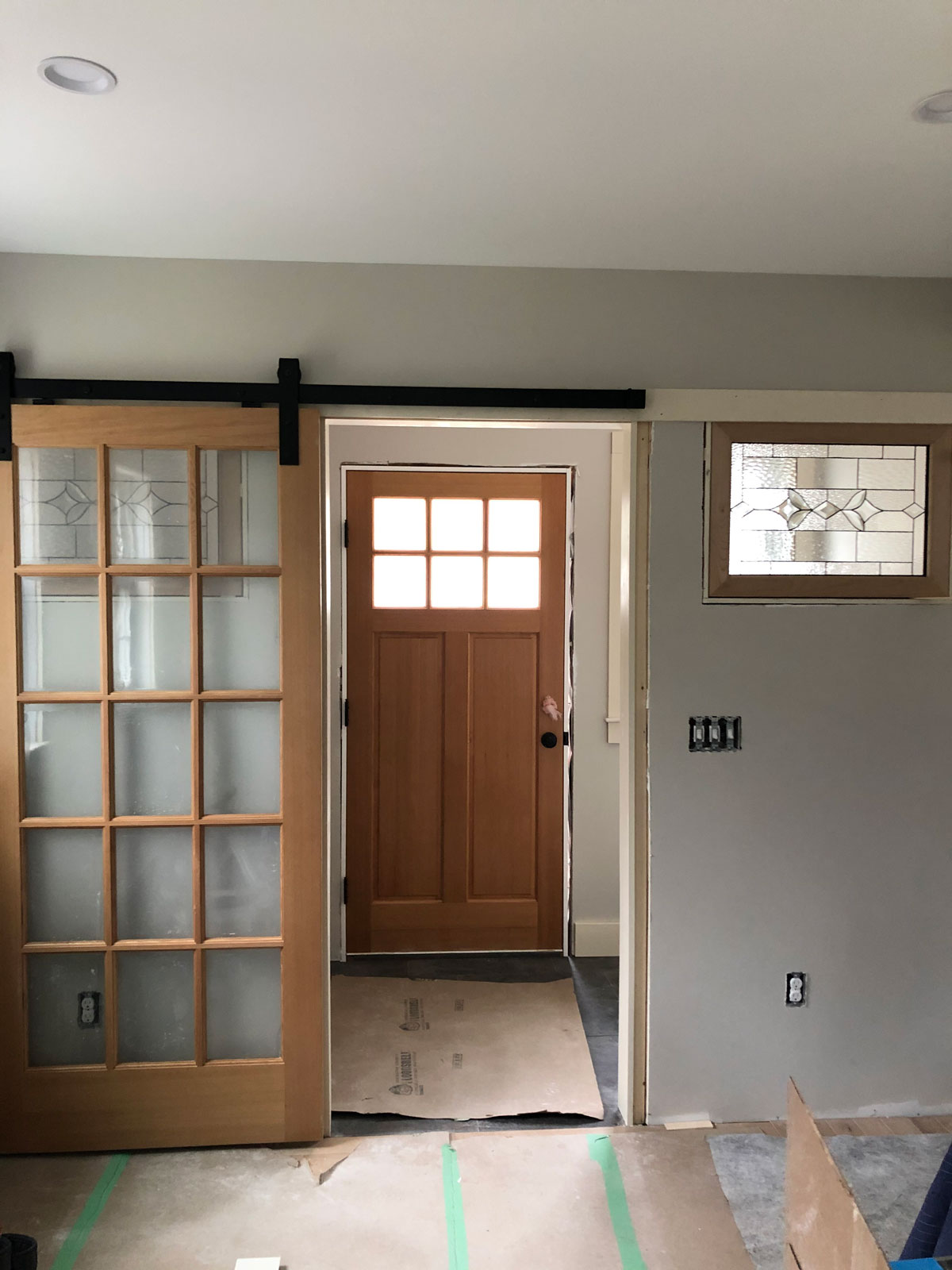 Single pane Stained Glass installed between two rooms.