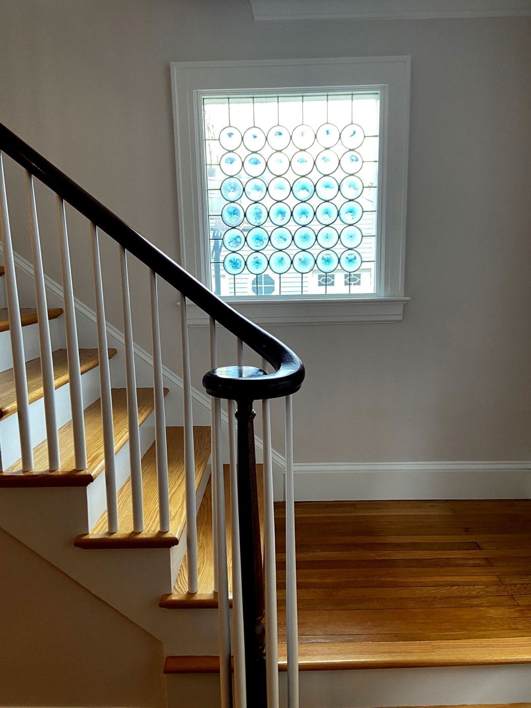 The Classic Rondel Stained Glass Installed on the living room