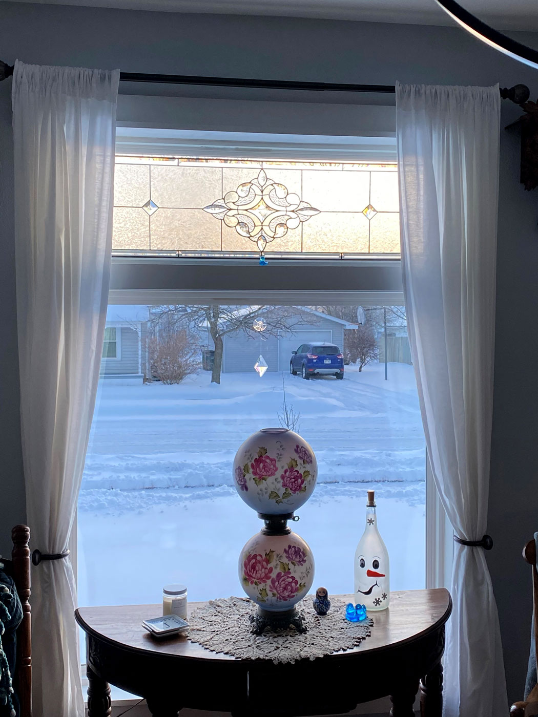 Amazing Stained Glass hung up over a Transom Window