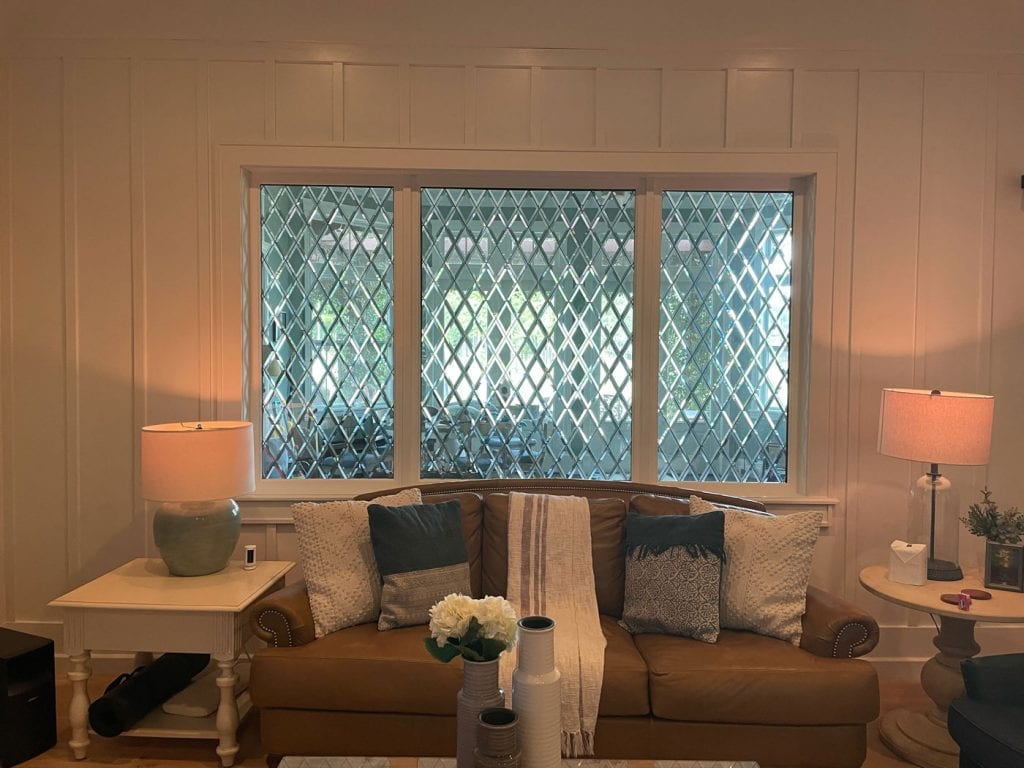 Classic Tudor Style Stained Glass Window Installed in a Living room