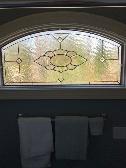 Clear Stained Glass Window installed on a bathroom window