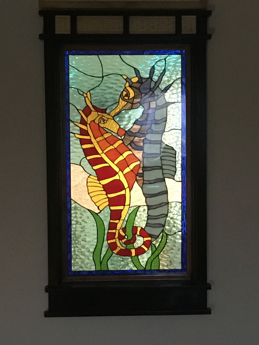 Stained Glass sealed within tempered glass , which customer framed in between two rooms.