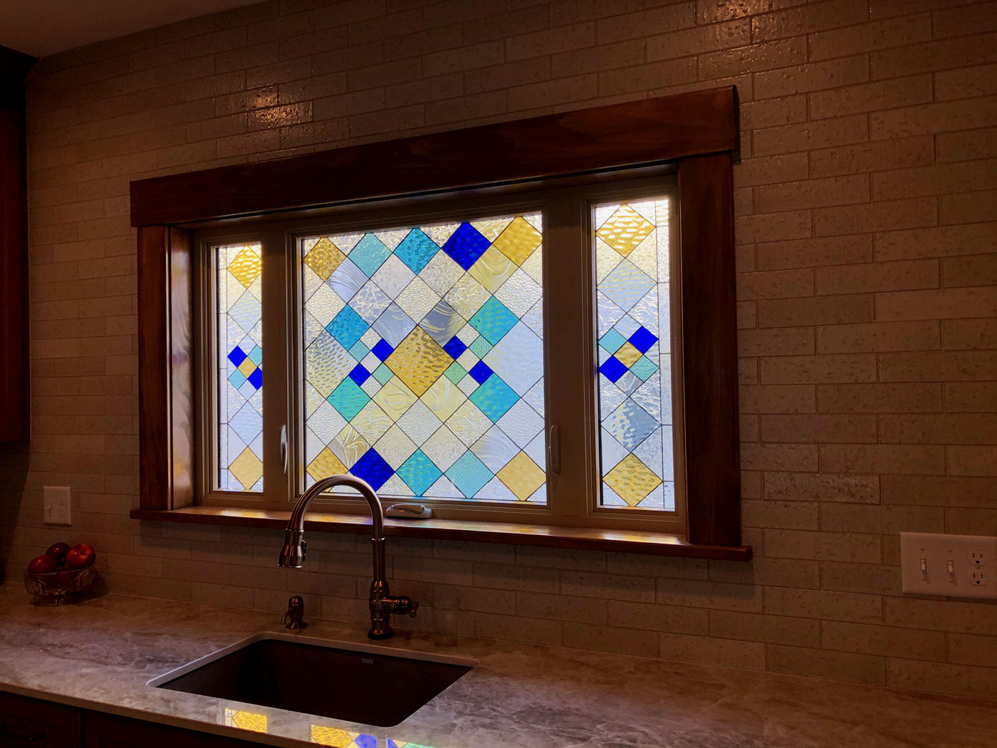 Beautiful Stained Glass installed over a Kitchen Sink