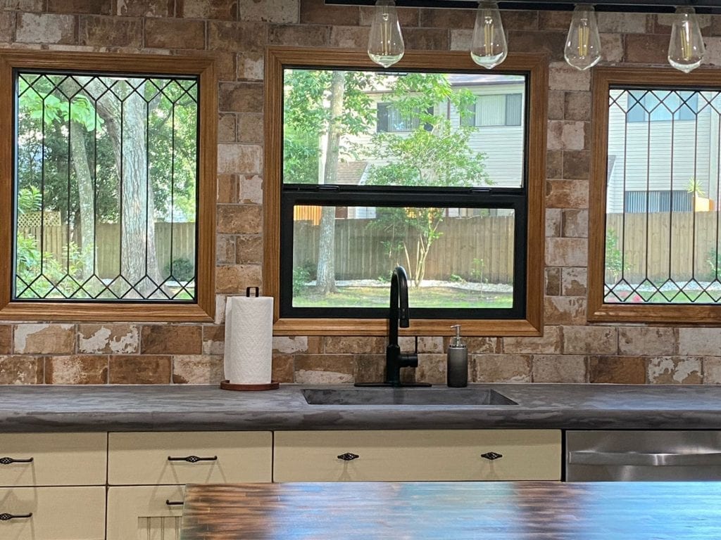 Classic Style trimmed in Stained Glass Windows Installed over a sink