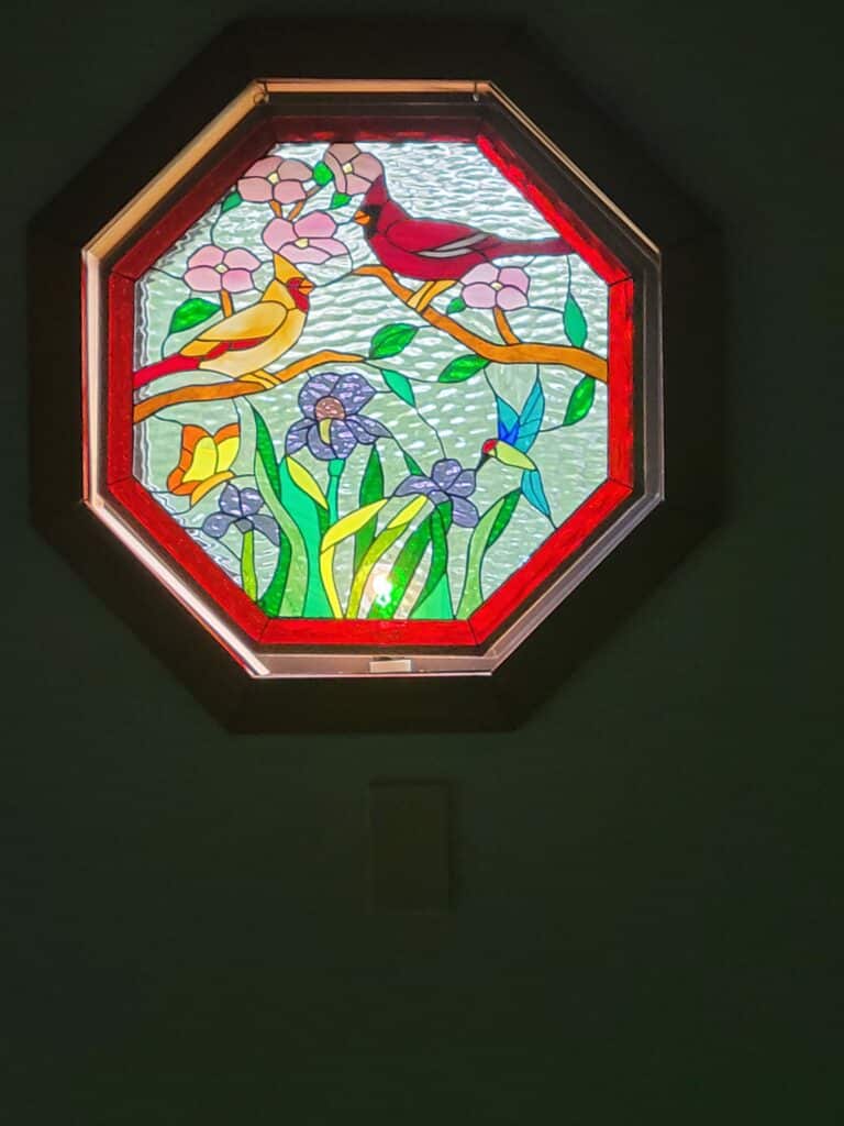 custom octagon stained glass, made to hang and fill the space in clients clear window for privacy and beauty