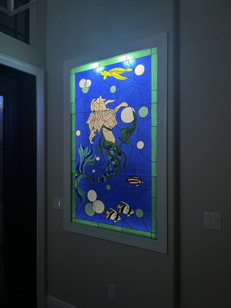 Mermaid and Palm Stained Glass Installed.