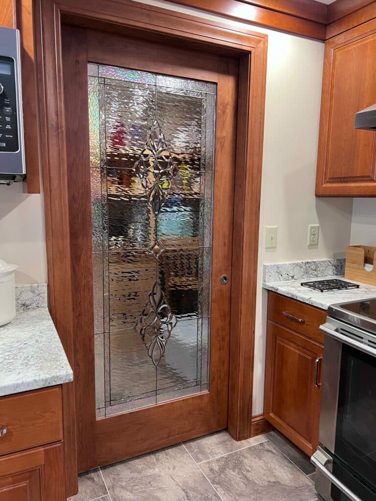 BEAUTIFUL! Clear and beveled pantry door installed
