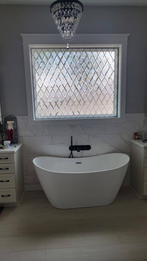 Beveled glue chip diamond minimal install installed in a Bathroom