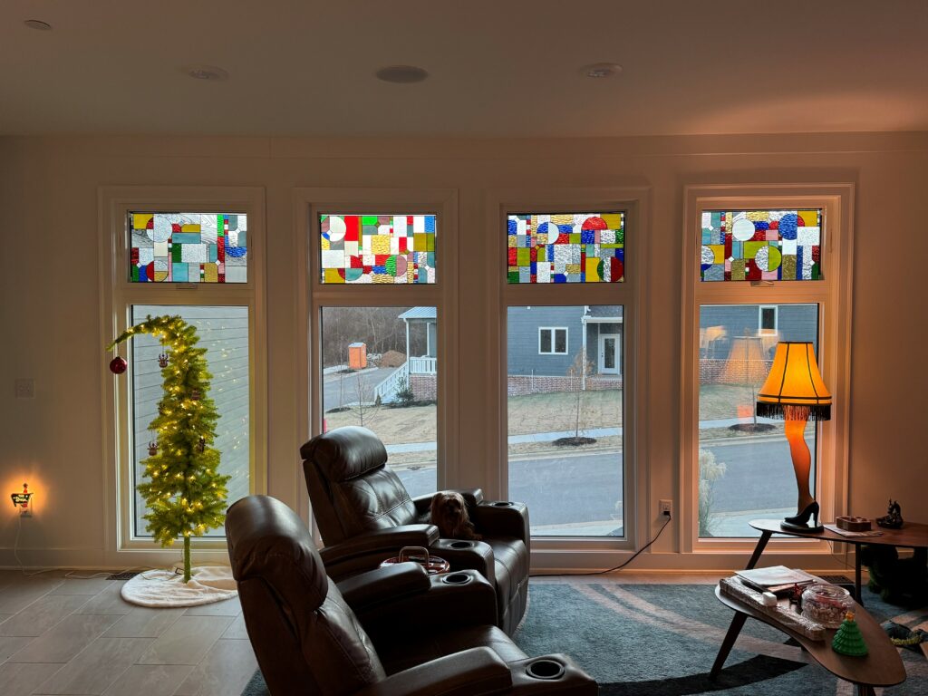 Frank Lloyd Wright inspired stained glass mounted to window sill openings.