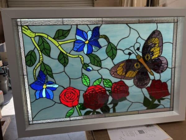 The "Butterfly & Flower Patch " Leaded Stained Glass & Beveled Window is Install Ready & Vinyl Framed and Insulated