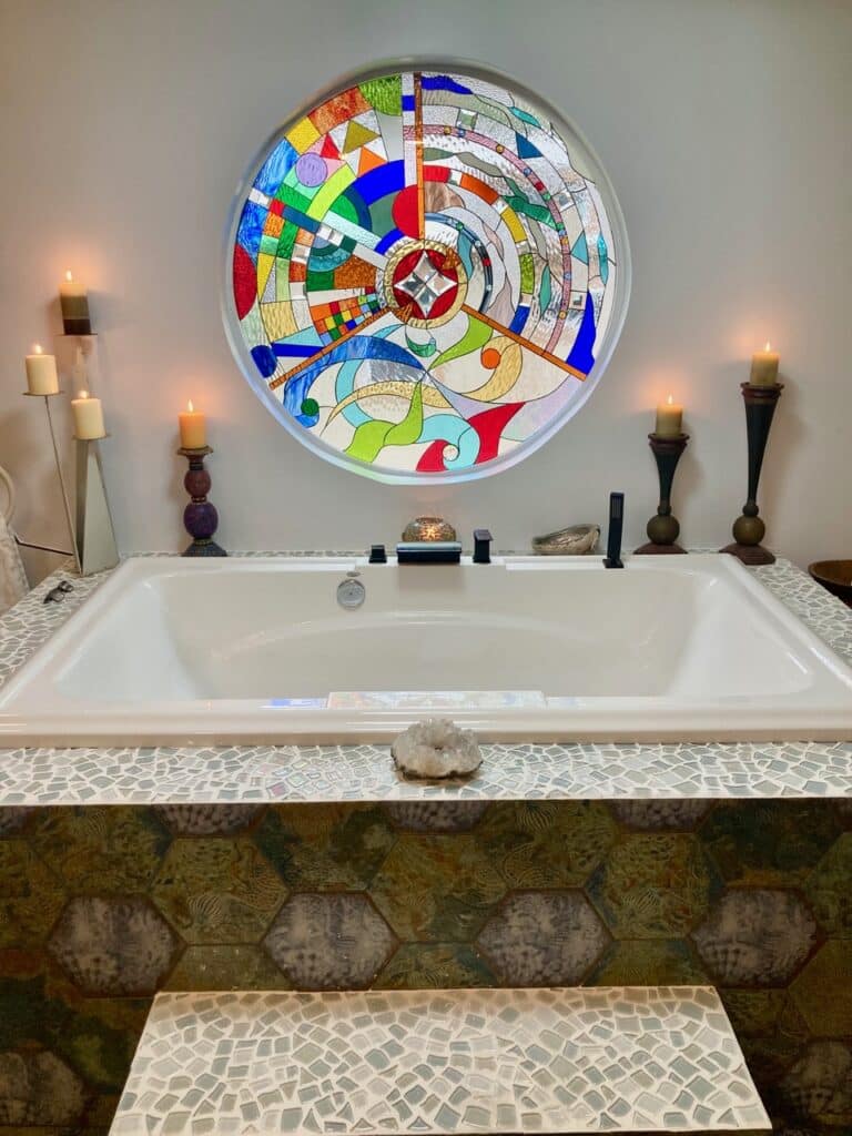 Breathtaking Round Stained Glass Feature Over bathtub