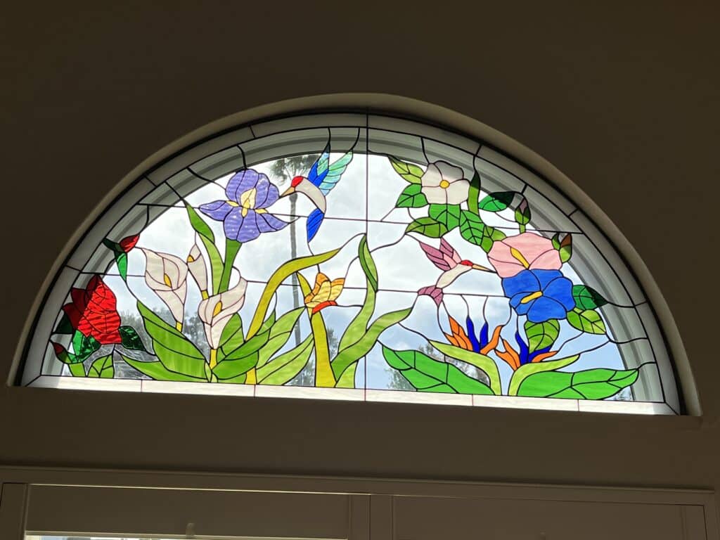 Arched Hummingbird & Flowers Window