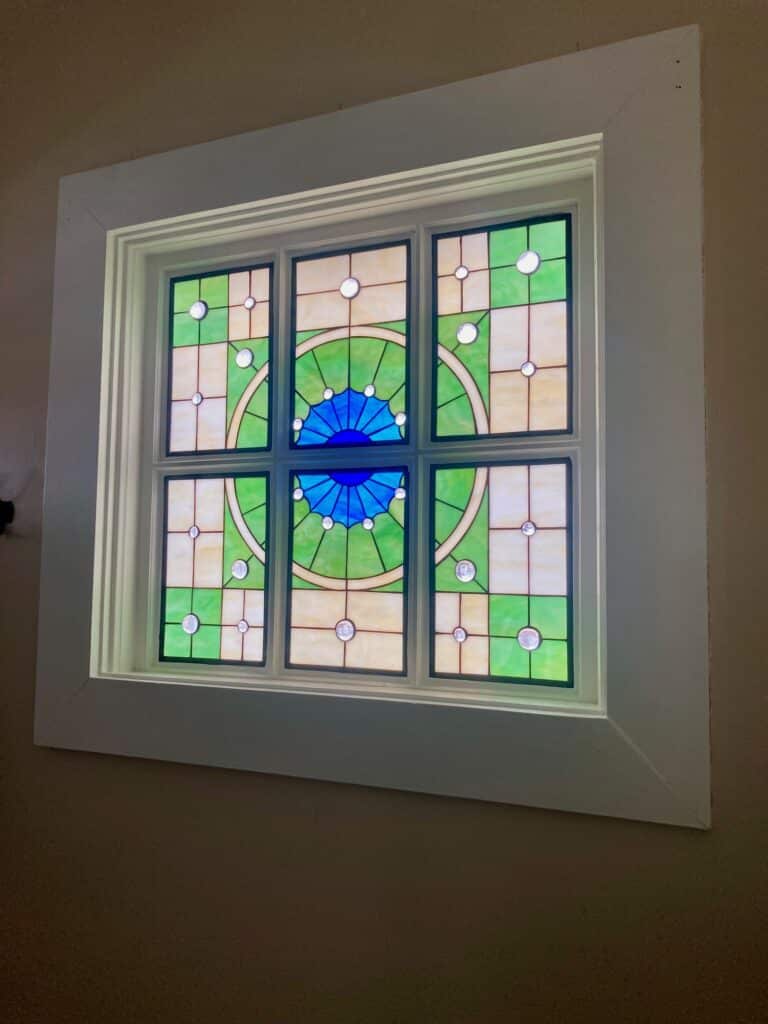 Before and After: Stunning Stained Glass Transformation with Wood Mullions