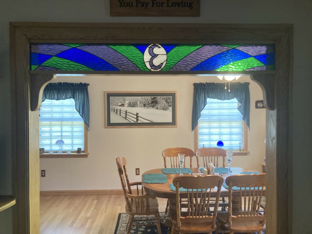 Transom window installed between two rooms
